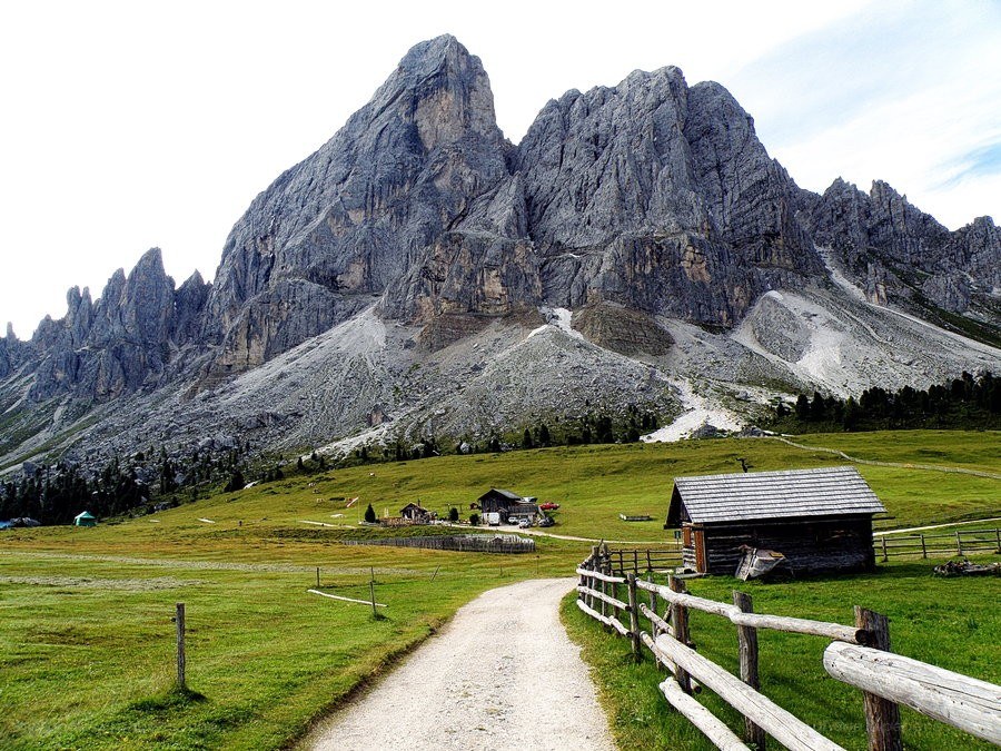 Mountain path with alpine huts