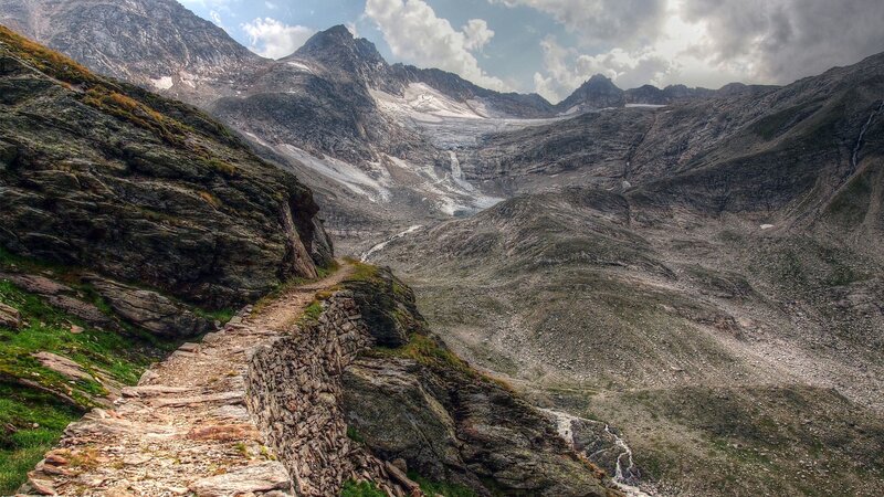 Mountain path with glacier view