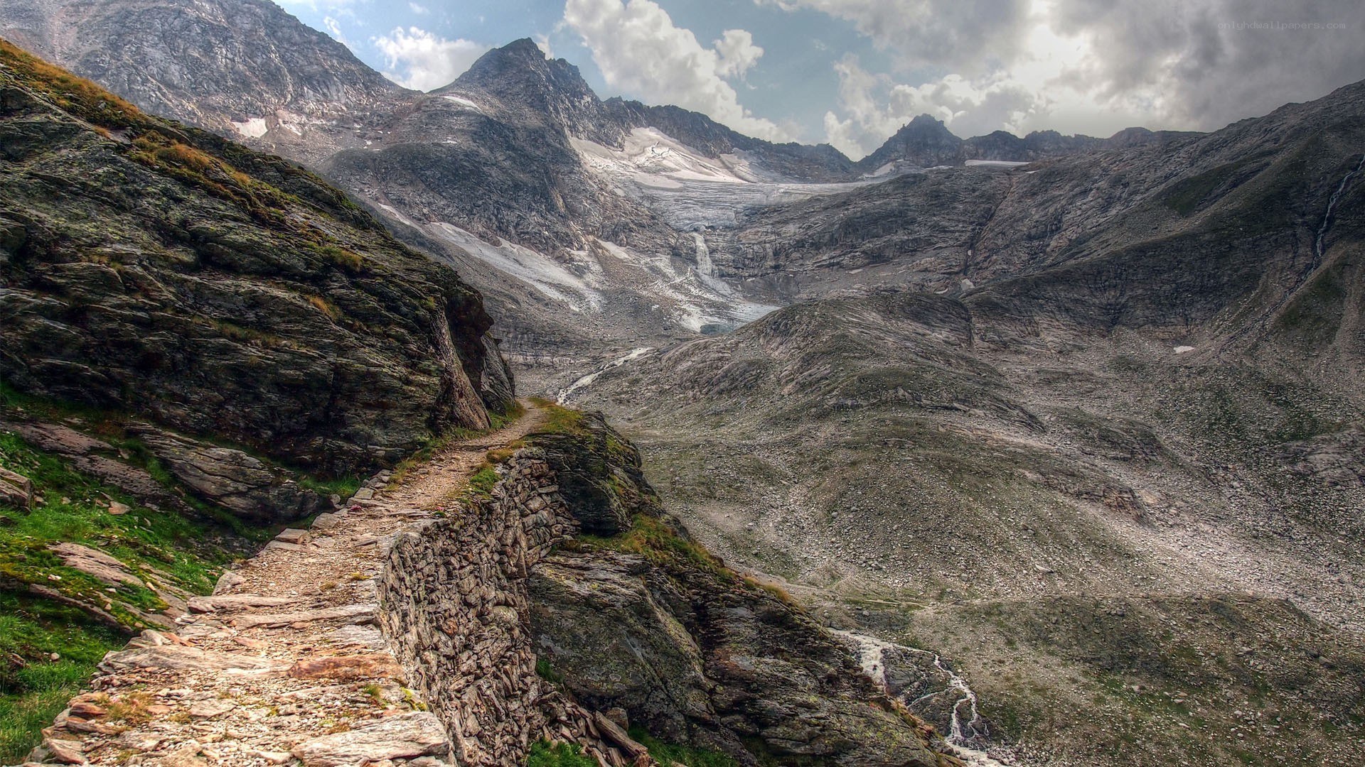 Mountain path with glacier view