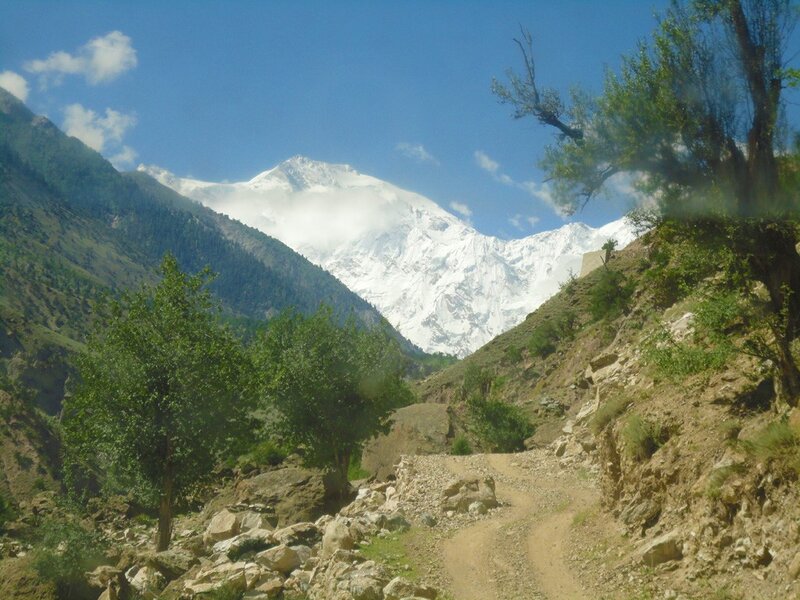 Mountain path with snow-capped peak