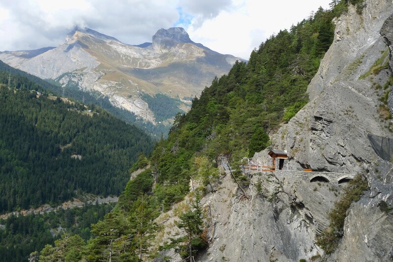 Mountain path with tunnel entrance