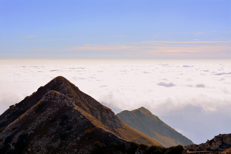 Mountain peak above clouds