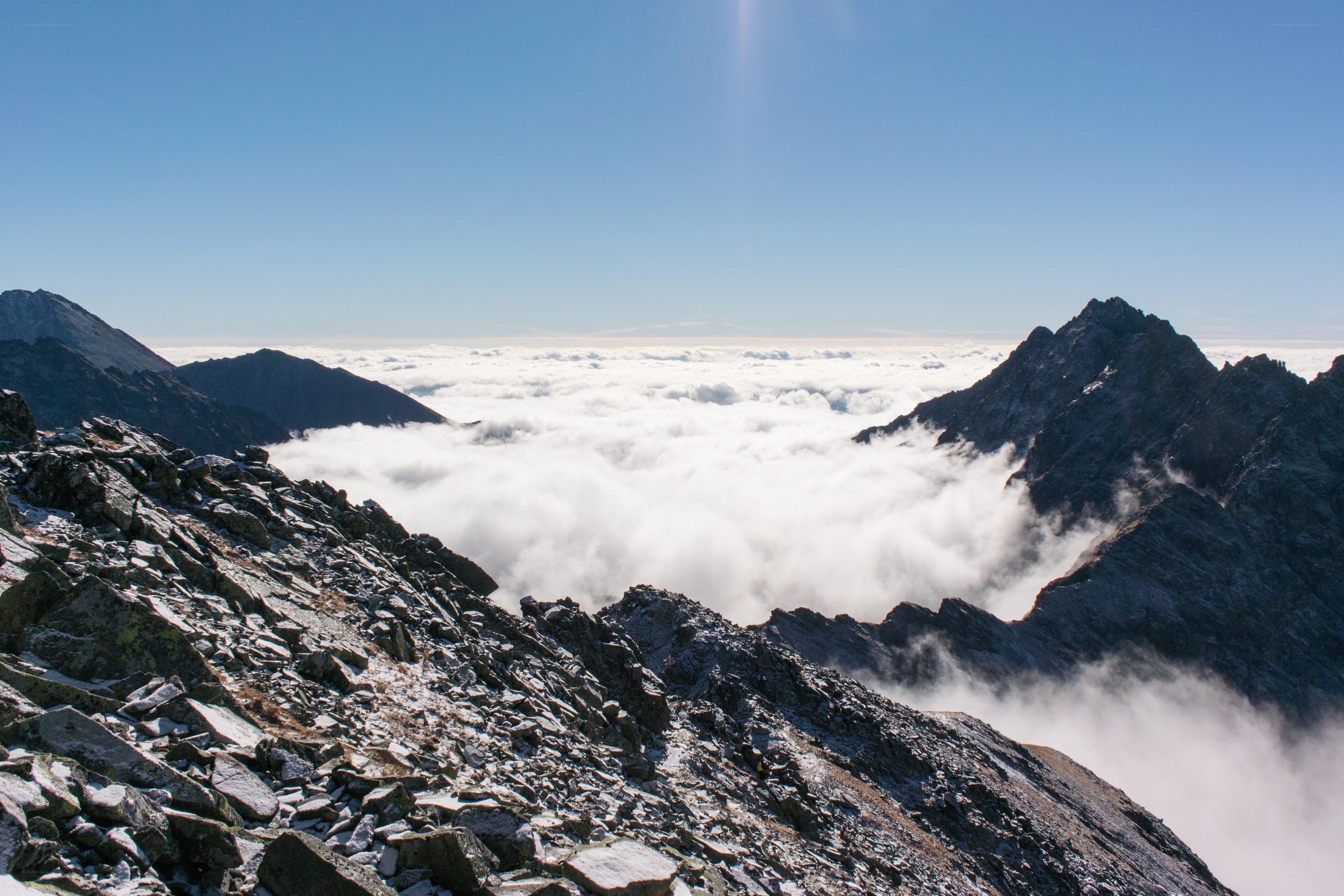 Mountain peak above clouds