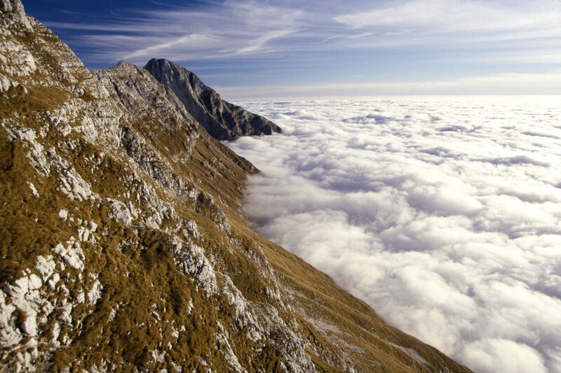 Mountain peak above clouds