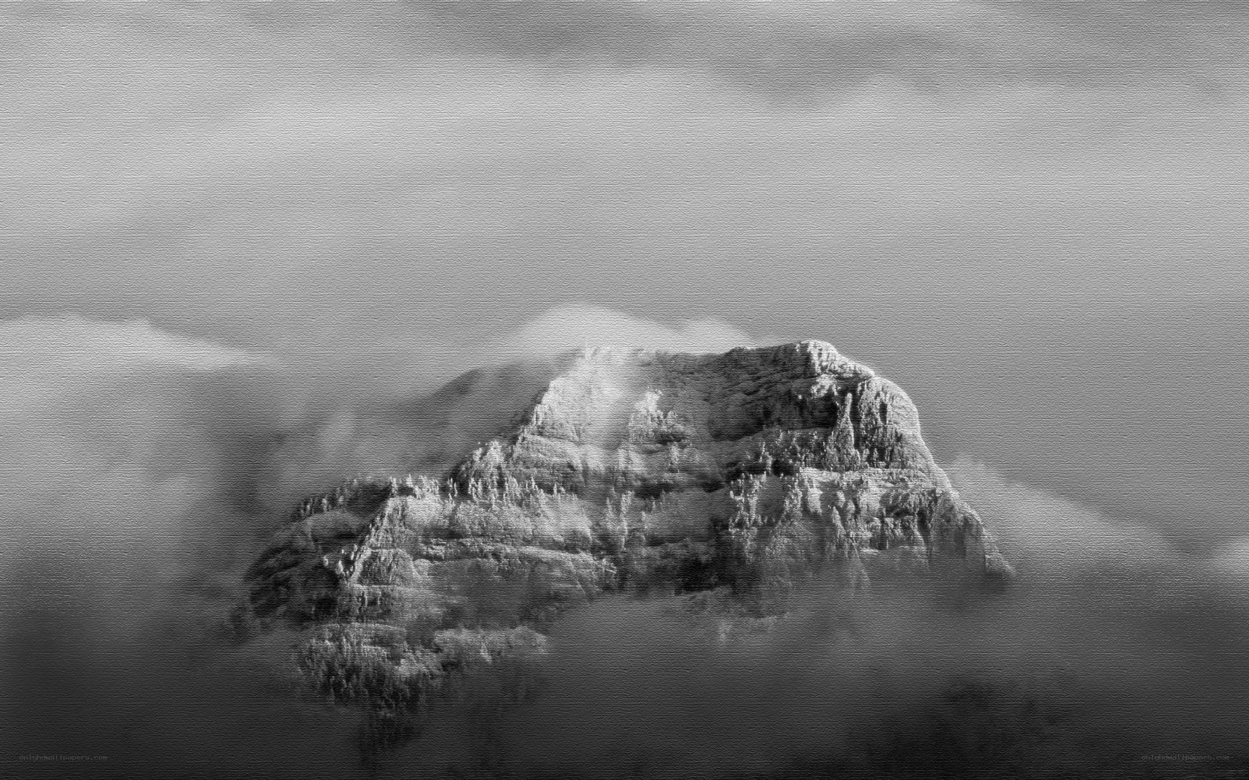 Mountain peak above clouds