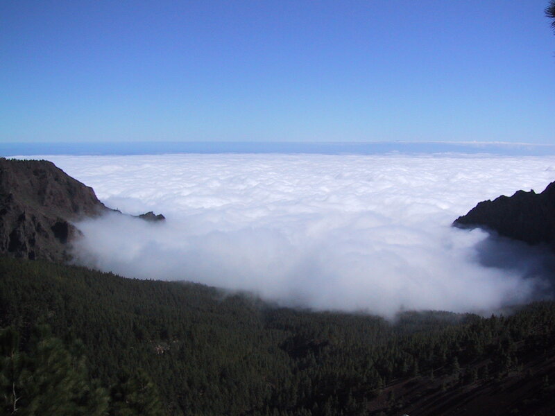 Mountain peak above clouds