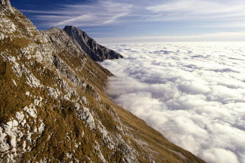 Mountain peak above clouds