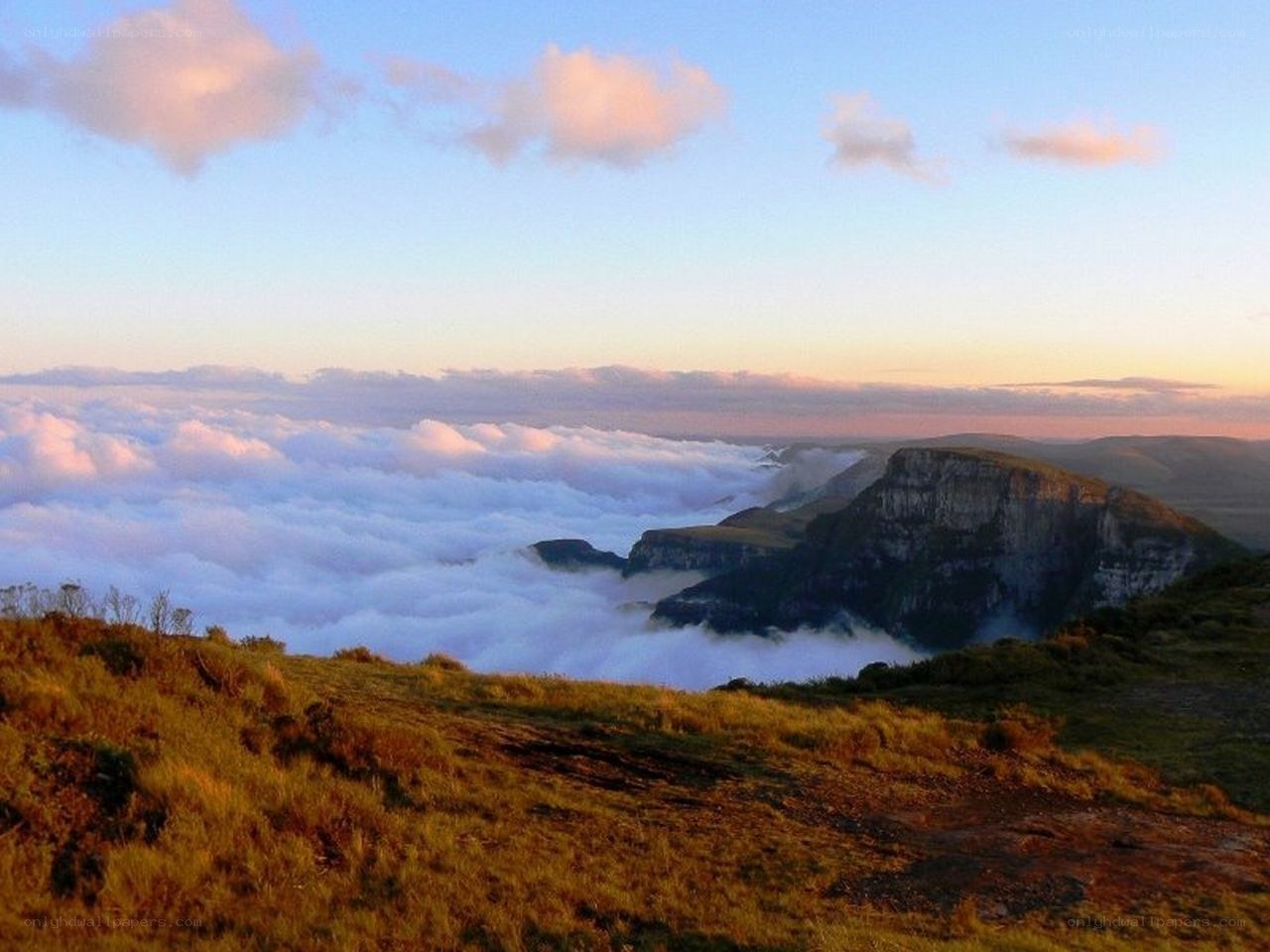 Mountain peak above clouds