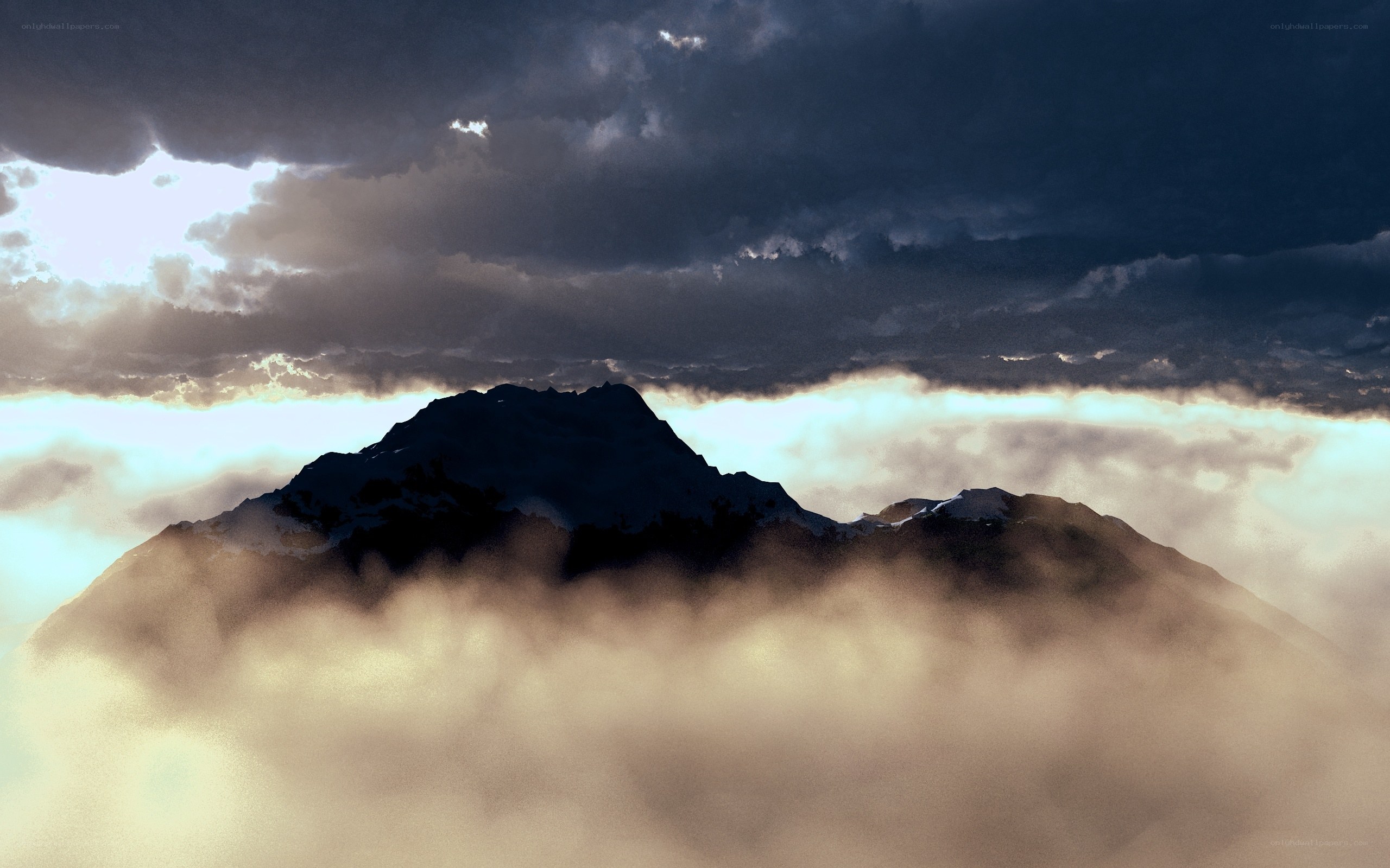 Mountain peak above clouds