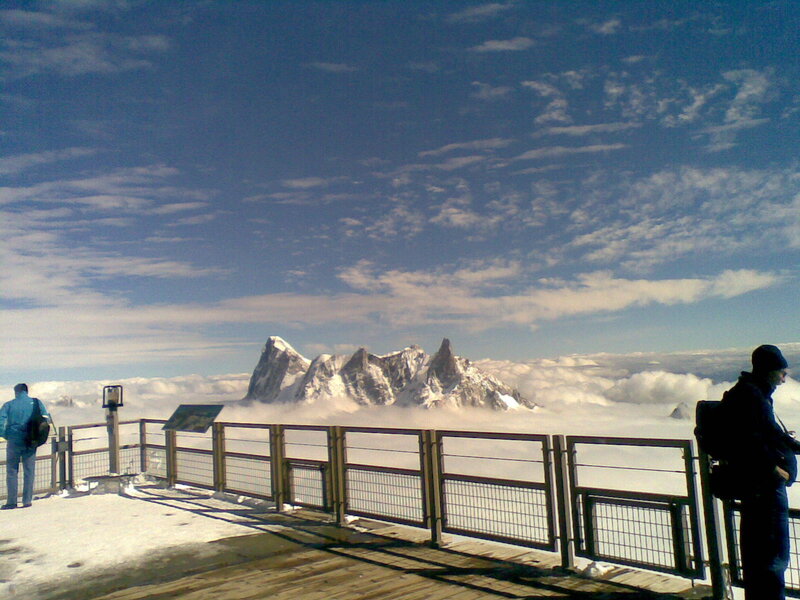 Mountain peak above clouds