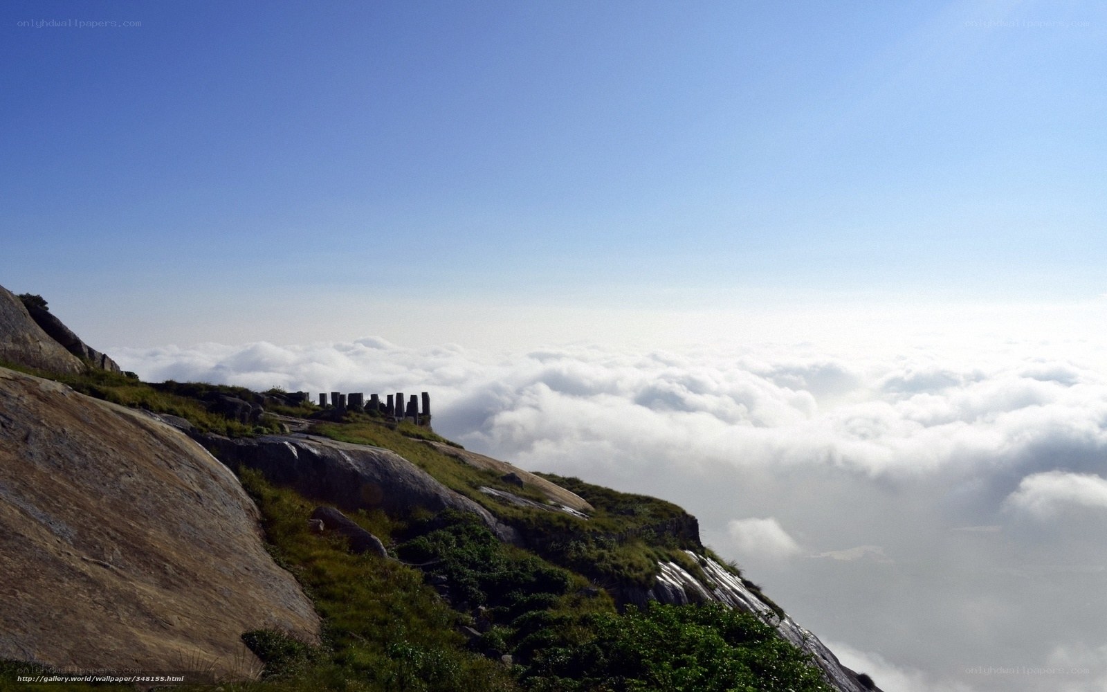 Mountain peak above clouds