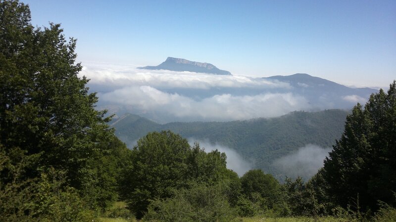Mountain peak above clouds