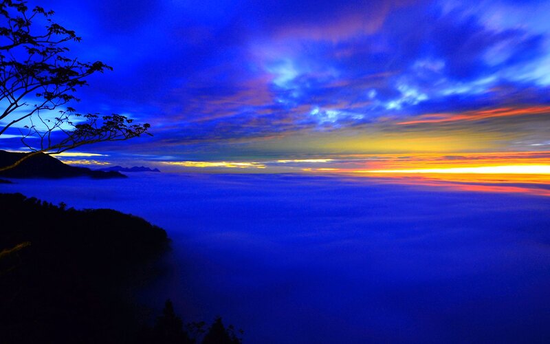 Mountain Peak Above Clouds — Blue, Dramatic, Sunrise, Photograph, Sky