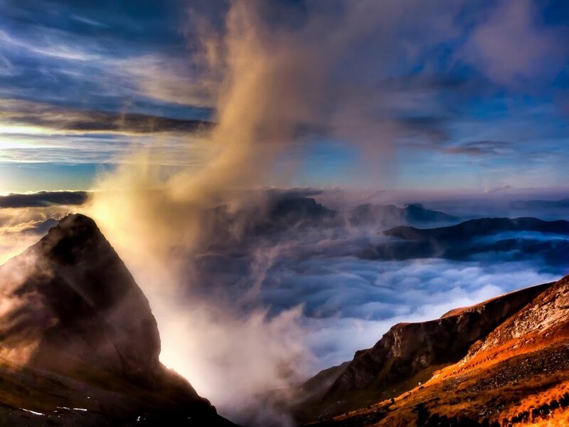 Mountain Peak Above Clouds — Blue, Dramatic, Sunrise, Photograph