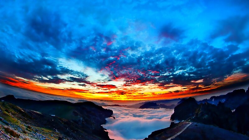 Mountain Peak Above Clouds — Blue, Dramatic, Sunrise