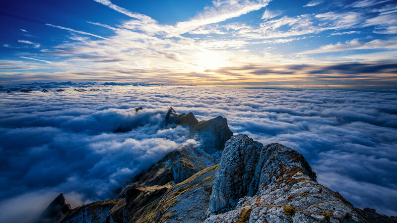 Mountain Peak Above Clouds — Blue, Dramatic, Sunset