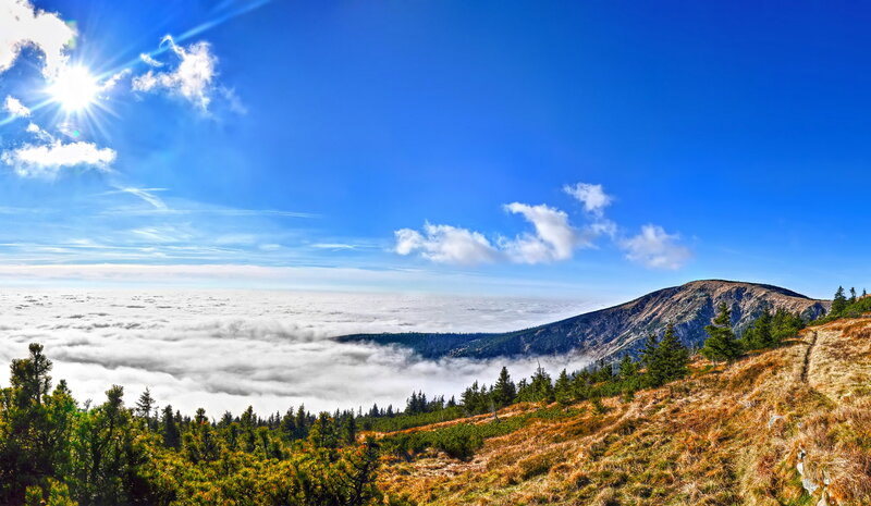 Mountain Peak Above Clouds — Blue, Serene, Afternoon, Photograph
