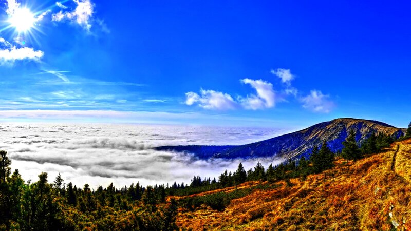 Mountain Peak Above Clouds — Blue, Serene, Afternoon