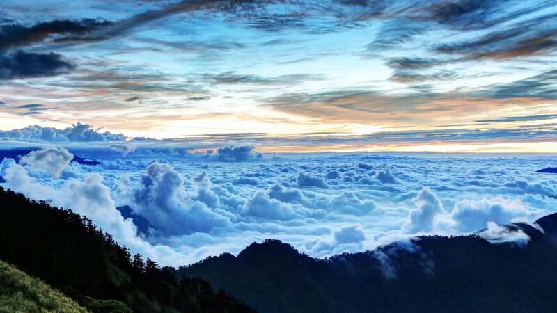 Mountain Peak Above Clouds — Blue, Serene, Sunrise, Photograph, Sky, Mountains