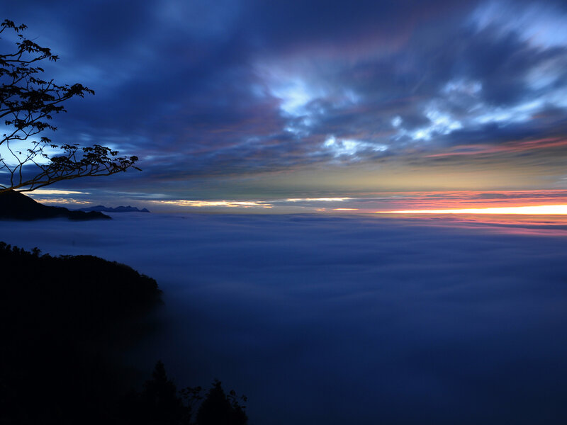Mountain Peak Above Clouds — Blue, Serene, Sunrise, Photograph