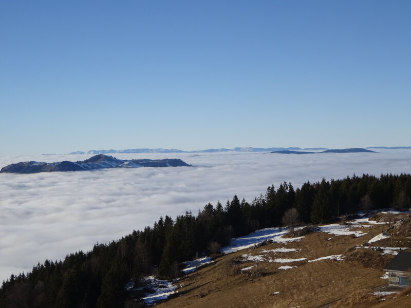 Mountain Peak Above Clouds — Blue, Serene, Winter