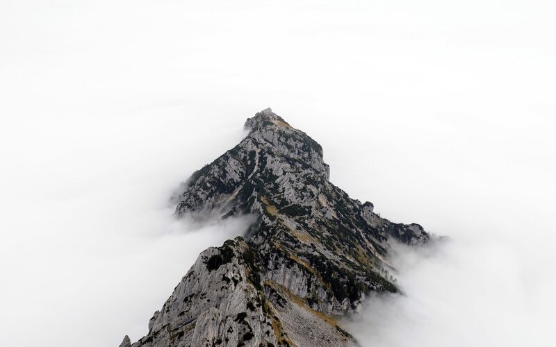 Mountain Peak Above Clouds — Gray, Serene, Photograph