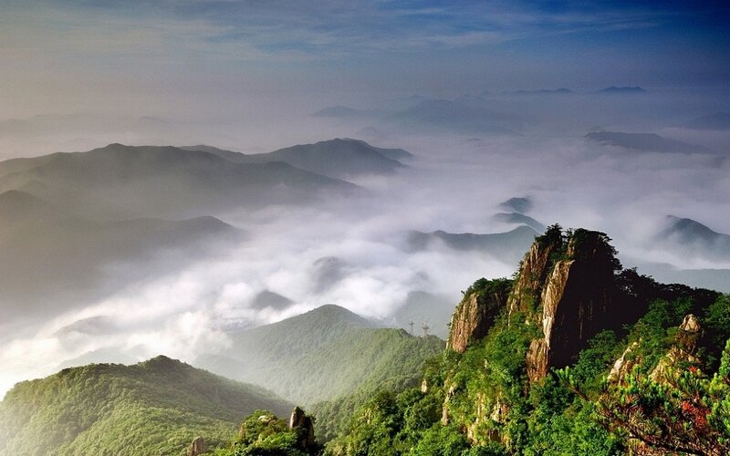 Mountain Peak Above Clouds — Green