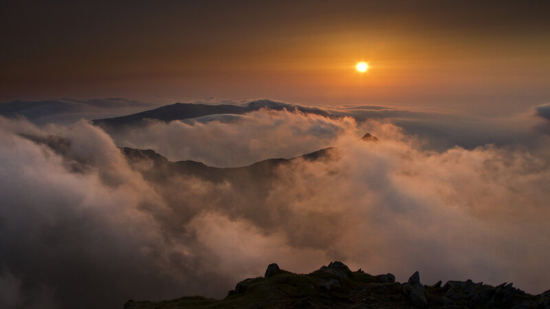 Mountain Peak Above Clouds — Orange, Dramatic, Sunset