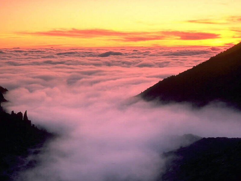 Mountain Peak Above Clouds — Orange, Serene, Sunrise