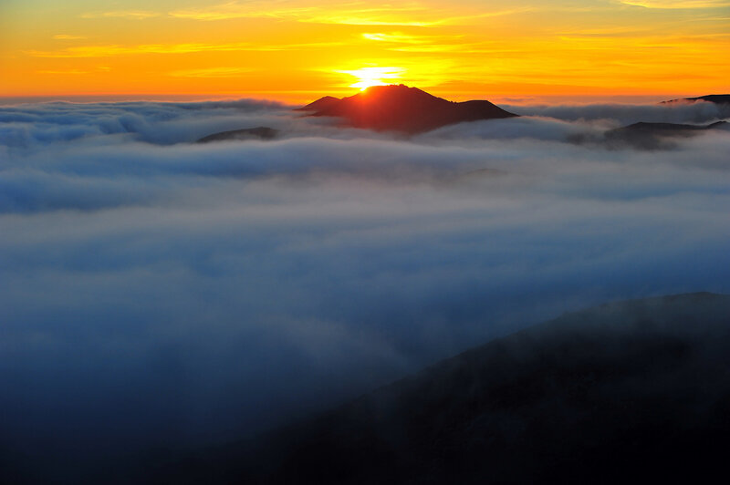Mountain Peak Above Clouds — Orange, Serene