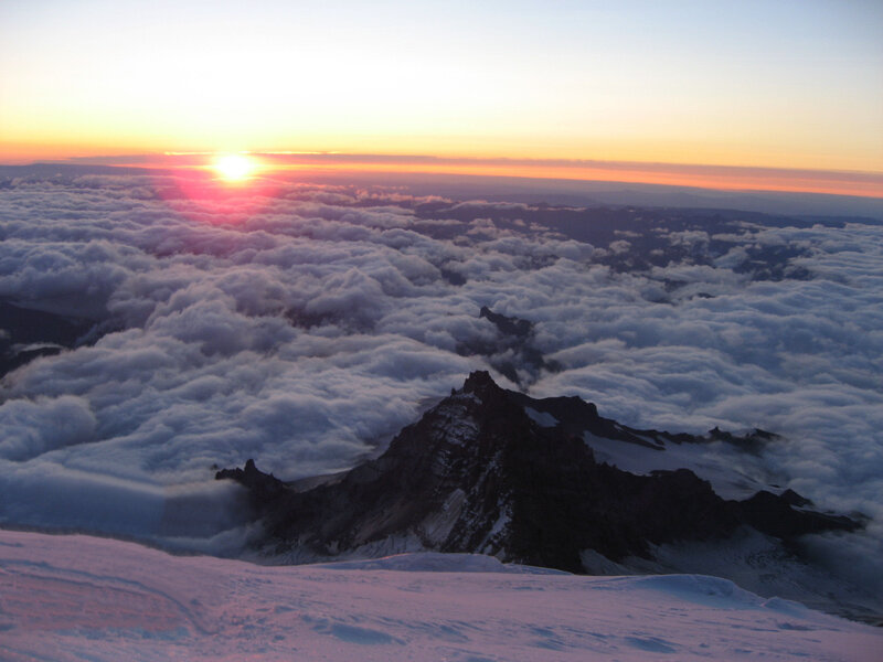 Mountain Peak Above Clouds — Orange
