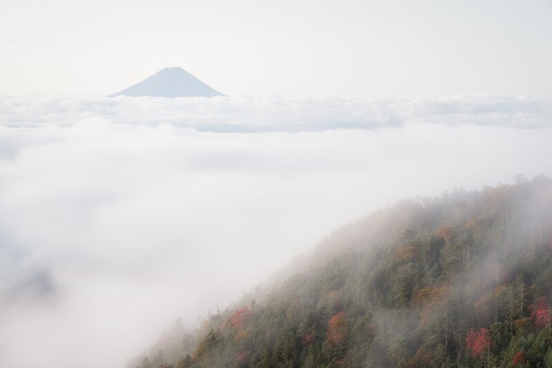 Mountain Peak Above Clouds — White, Serene, Autumn