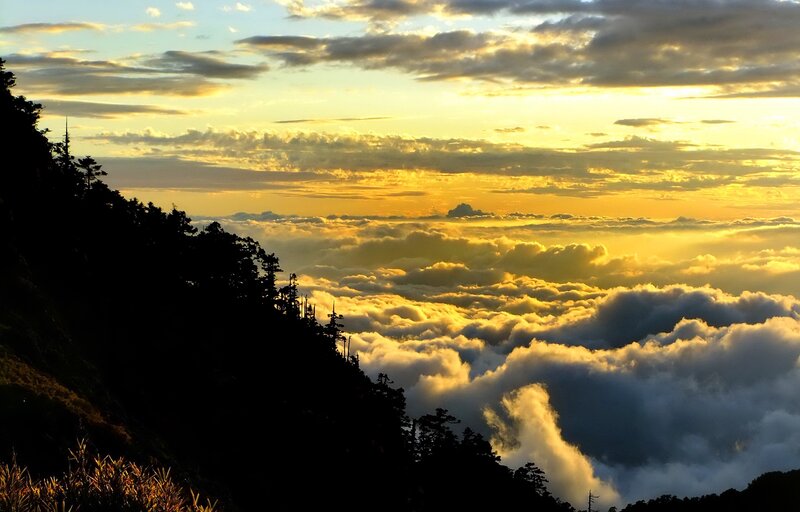 Mountain Peak Above Clouds — Yellow, Dramatic, Sunrise