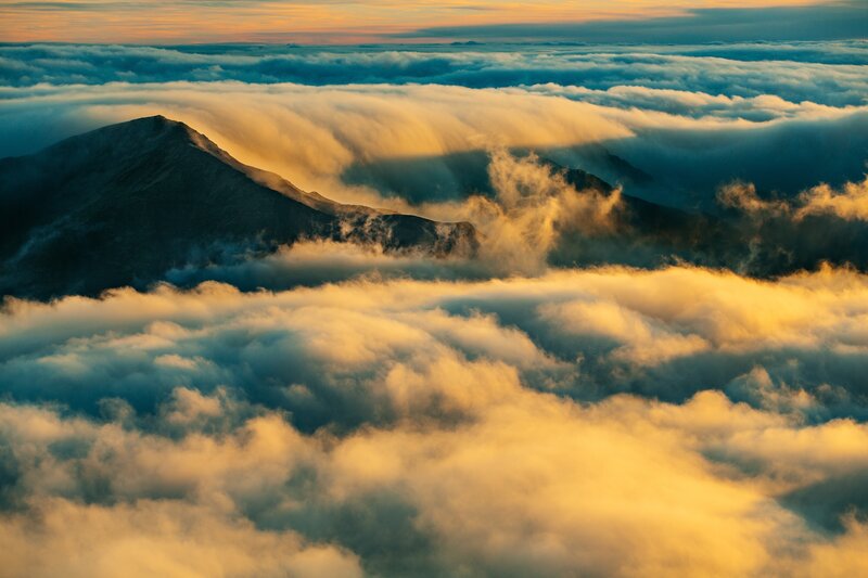 Mountain Peak Above Clouds — Yellow, Dramatic