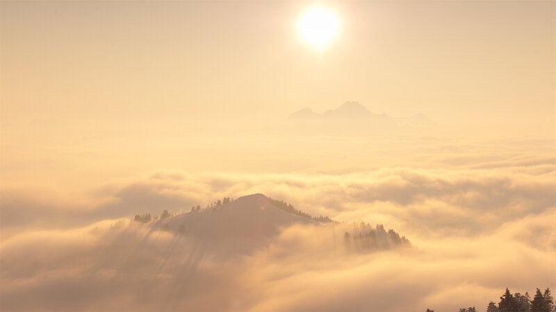 Mountain Peak Above Clouds — Yellow, Serene, Sunrise