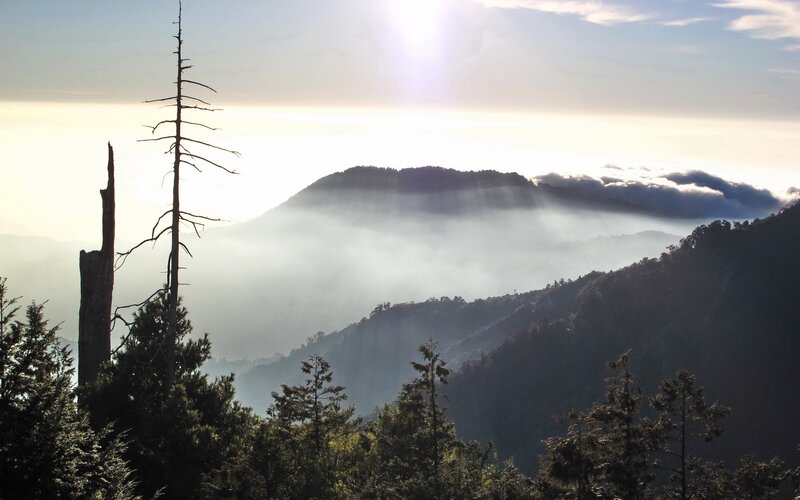 Mountain peak above the clouds