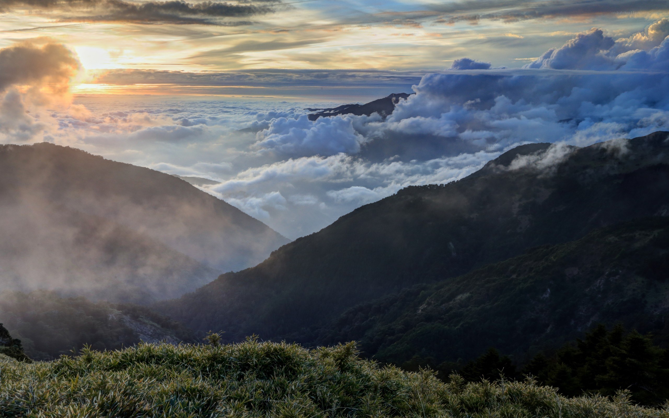 Mountain peak above the clouds