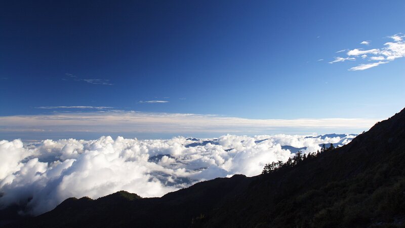 Mountain peak above the clouds