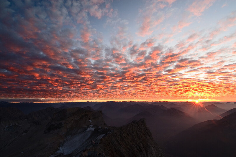 Mountain Peak at Sunrise — Orange, Dramatic, Photograph, Sun, Clouds, Mountains