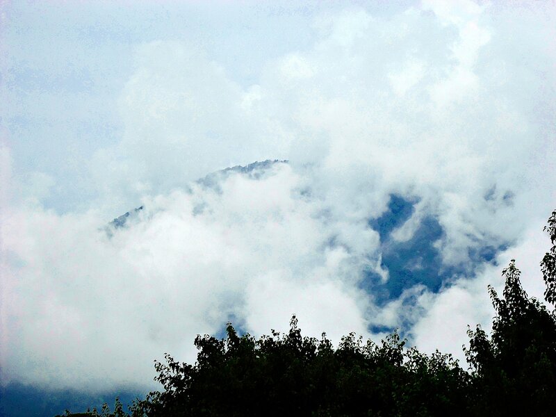 Mountain peak in clouds