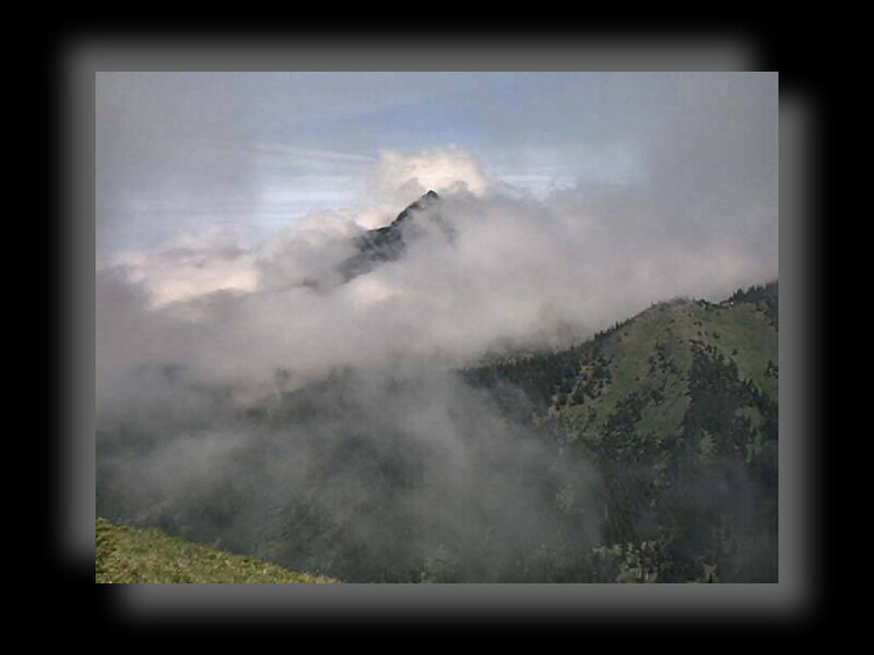 Mountain Peak in Clouds — Green