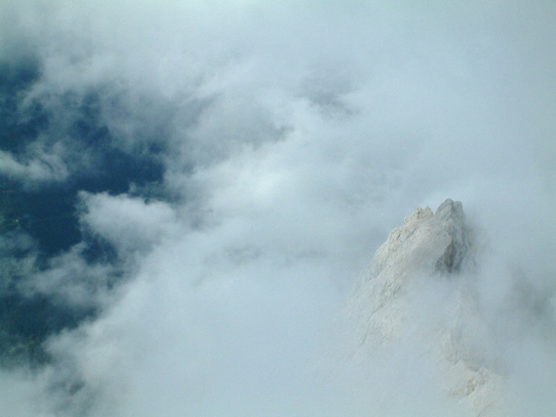 Mountain Peak in Clouds — White