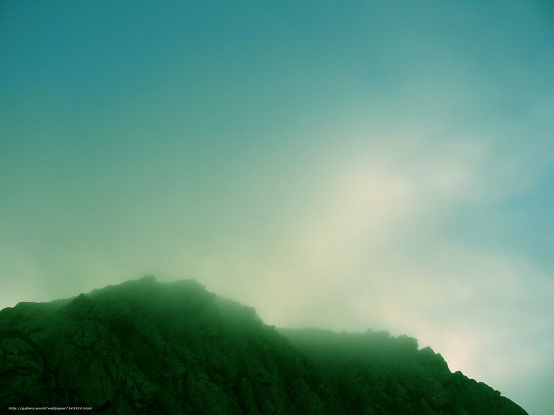 Mountain peak in mist