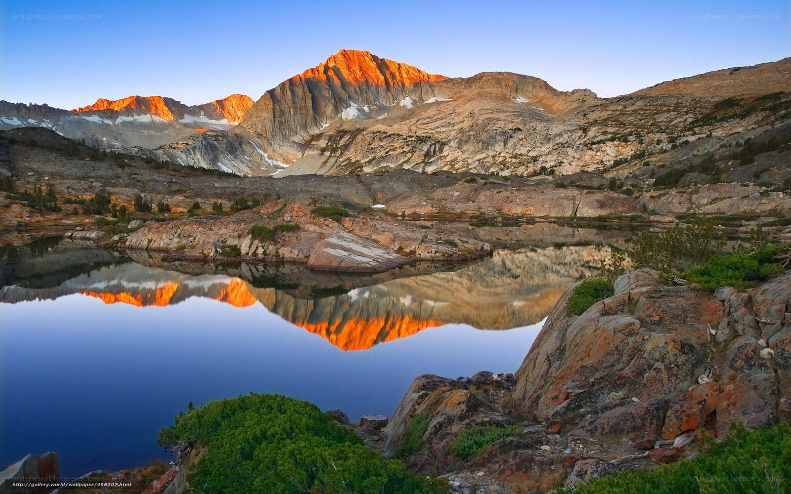 Mountain peak reflected in lake