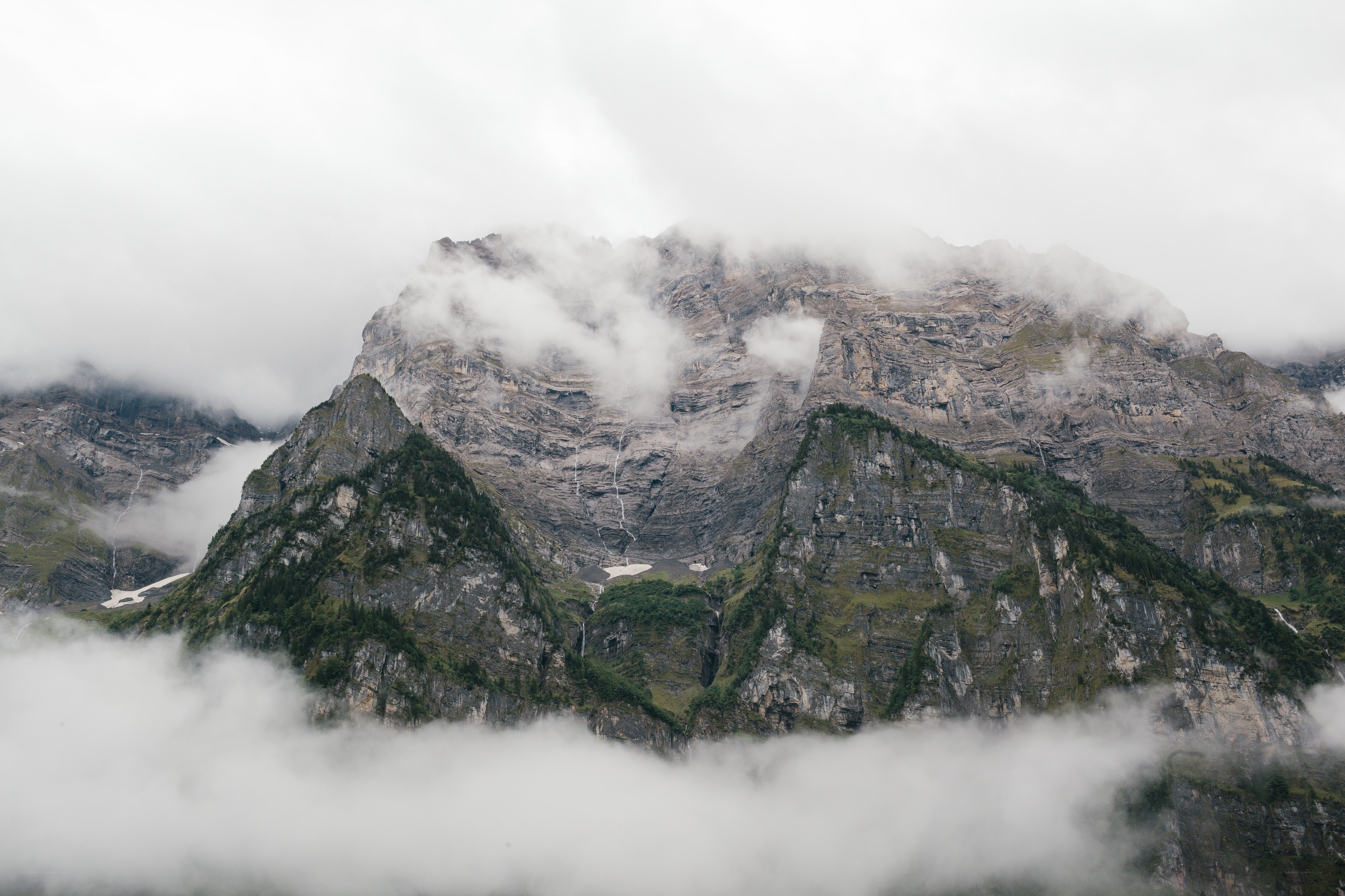 Mountain peak shrouded in clouds