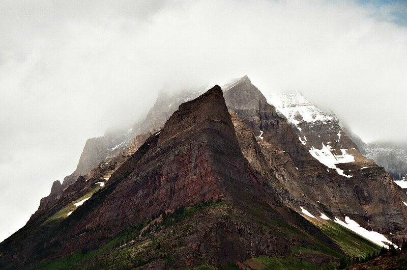 Mountain peak shrouded in clouds