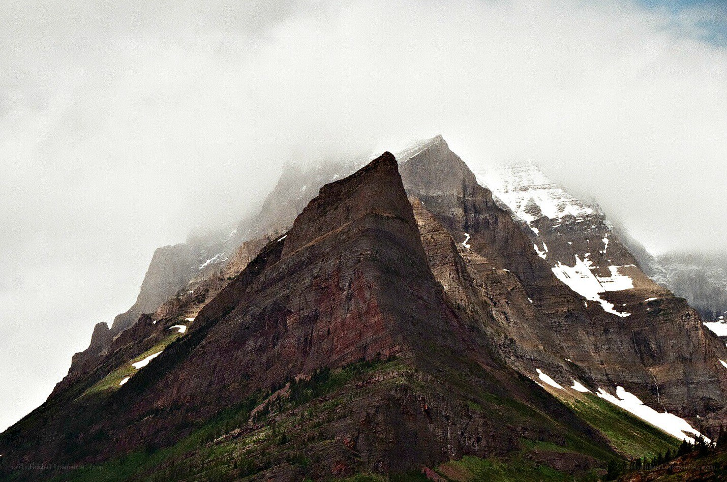 Mountain peak shrouded in clouds