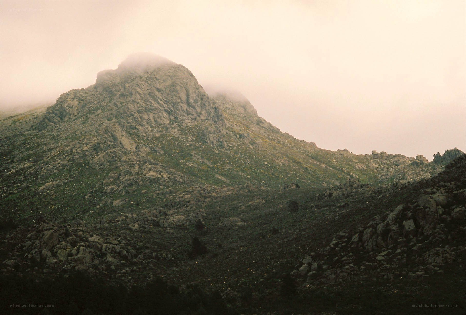 Mountain peak shrouded in mist