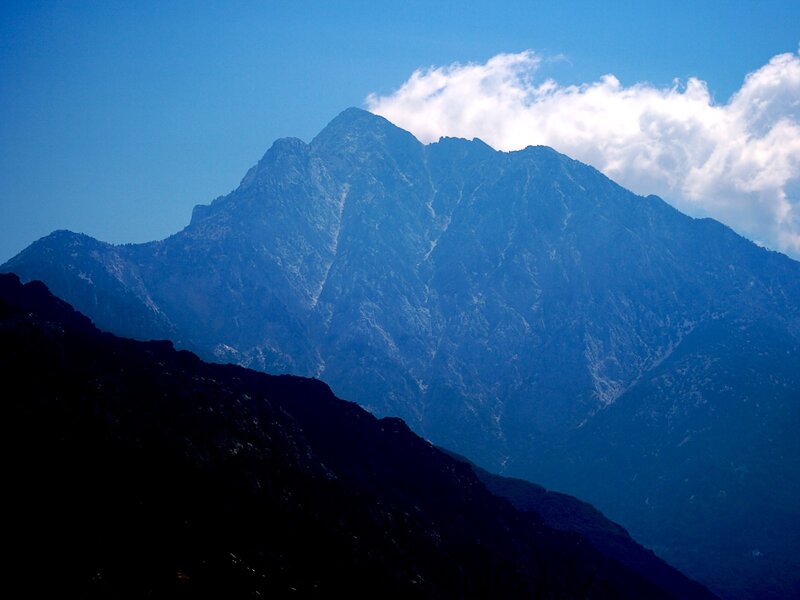 Mountain peak under blue sky