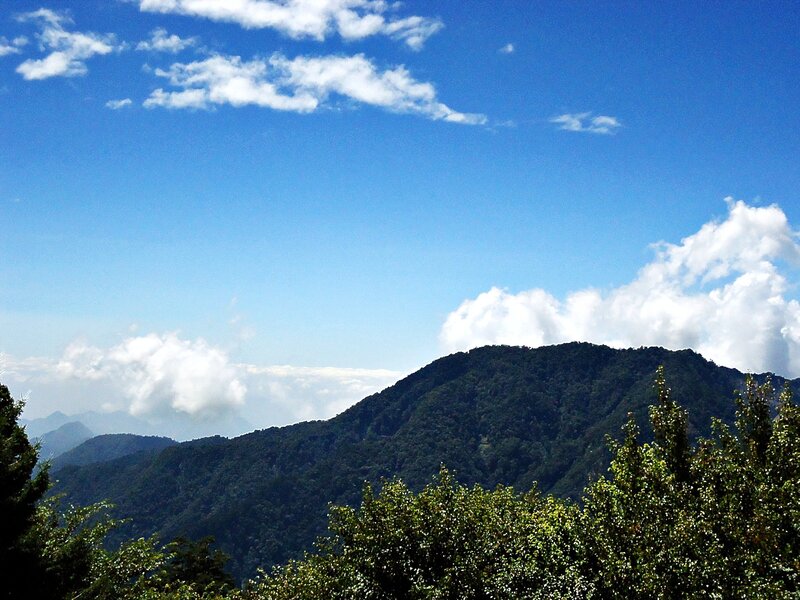 Mountain peak under blue sky